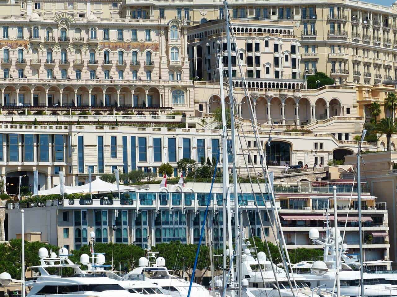Monaco harbour loop: Port Hercule energy, boats, and stacked city views
