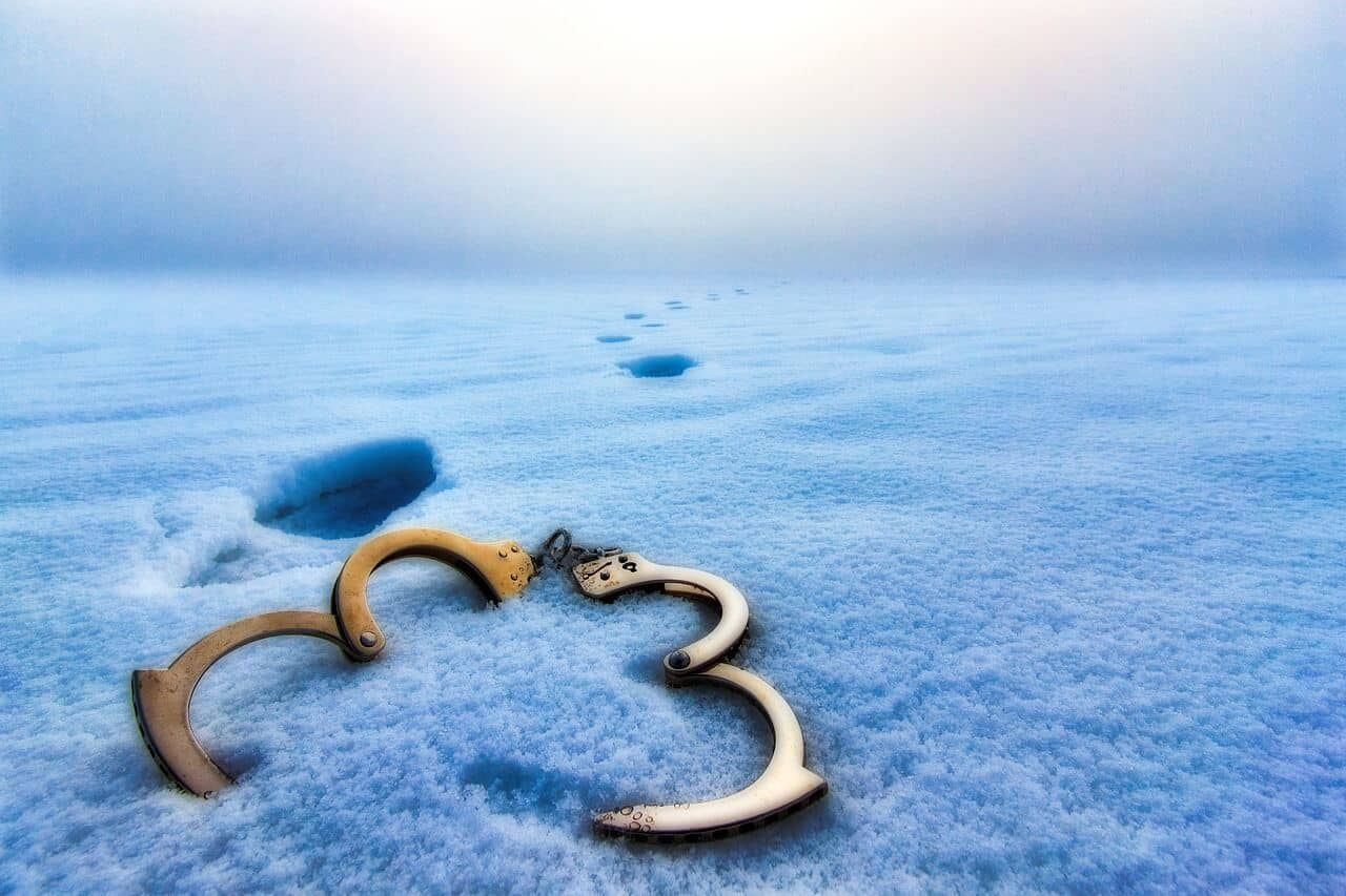handcuffs left behind in the snow