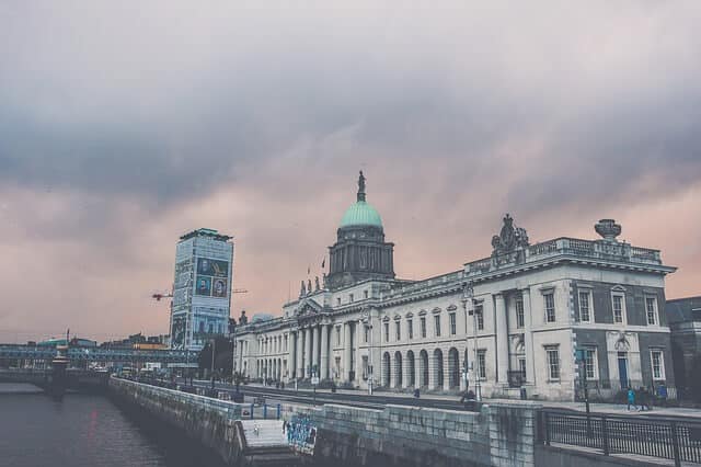 Dublin’s Custom House beside the River Liffey under an overcast sky