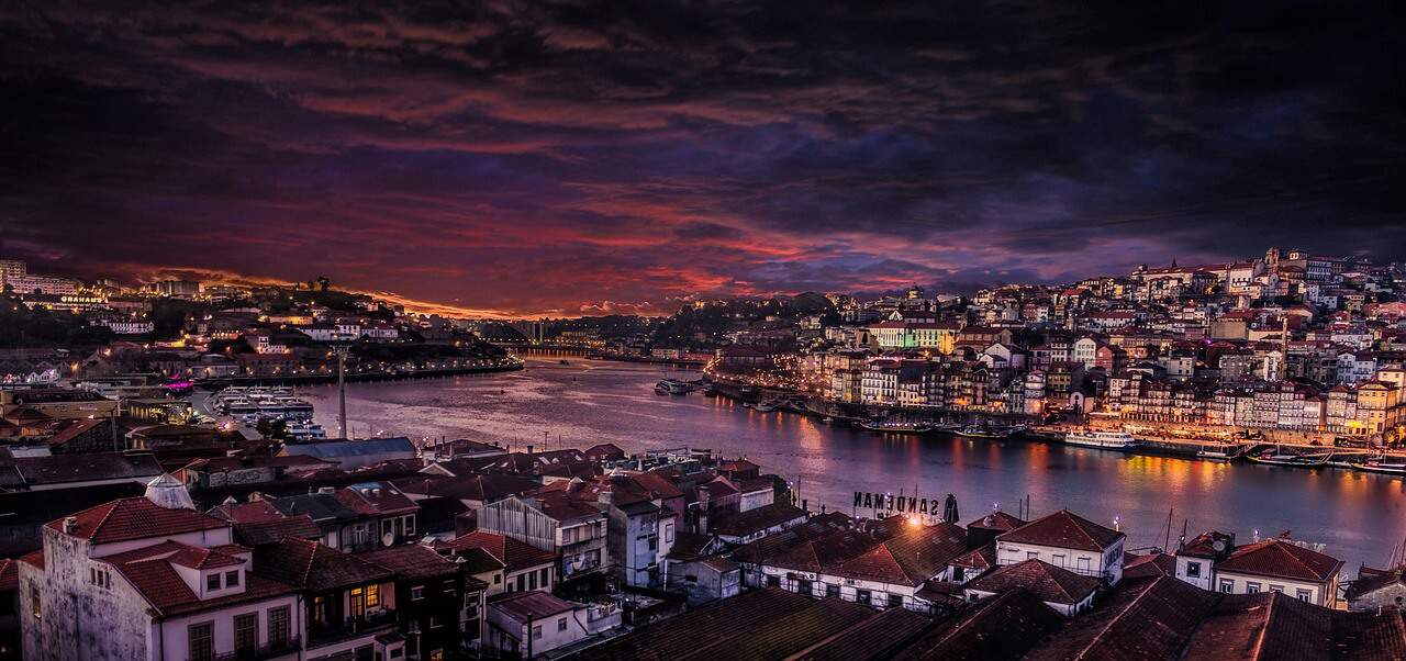 Porto waterfront and the Douro River at dusk, viewed from Vila Nova de Gaia