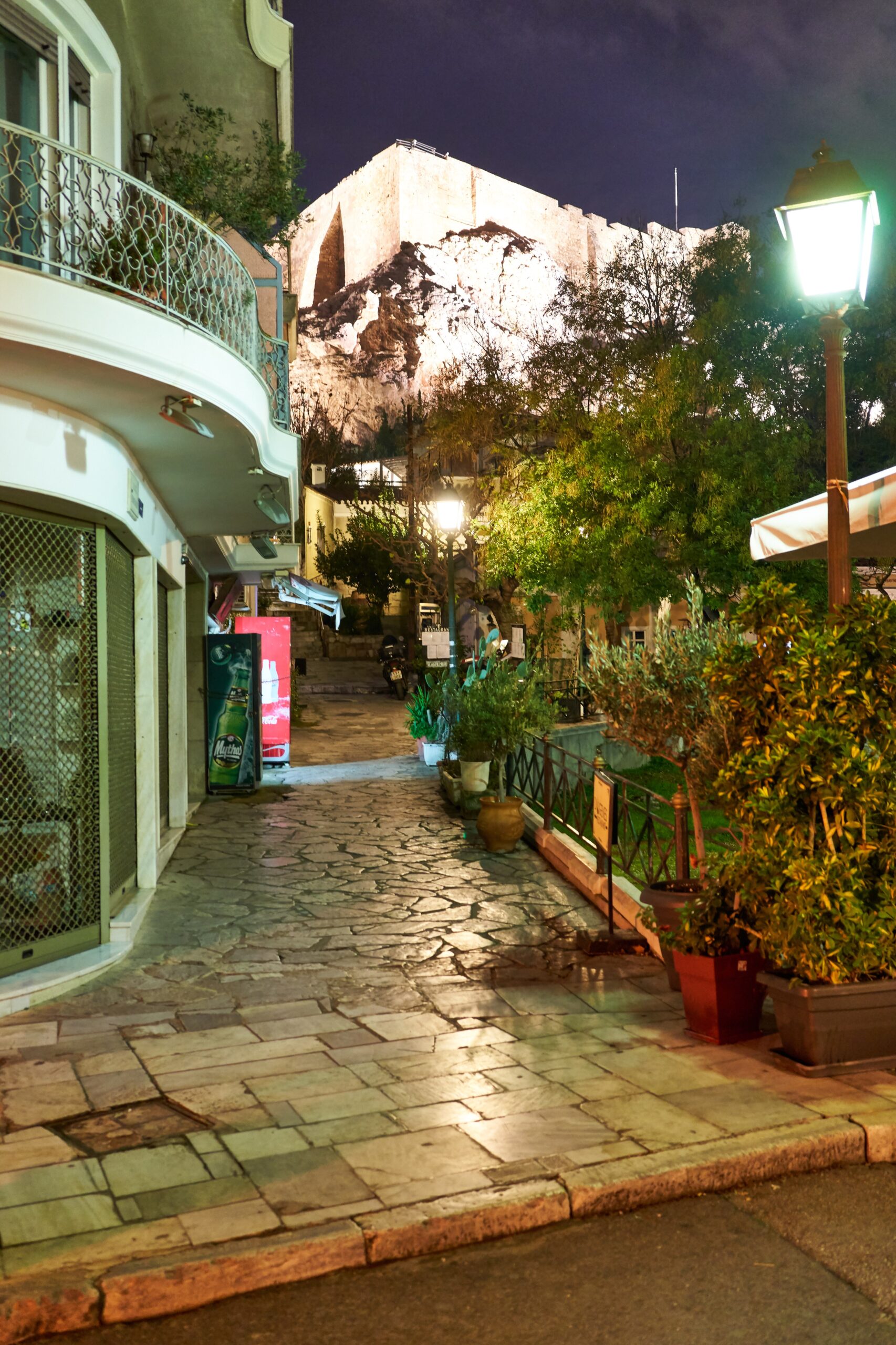 Greece: street in Plaka Athens with the Acropolis visible in the background