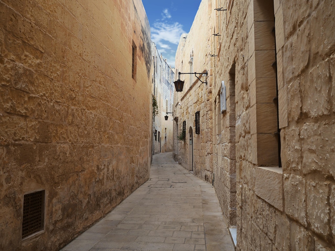 Malta: a narrow stone street inside the walled city of Mdina