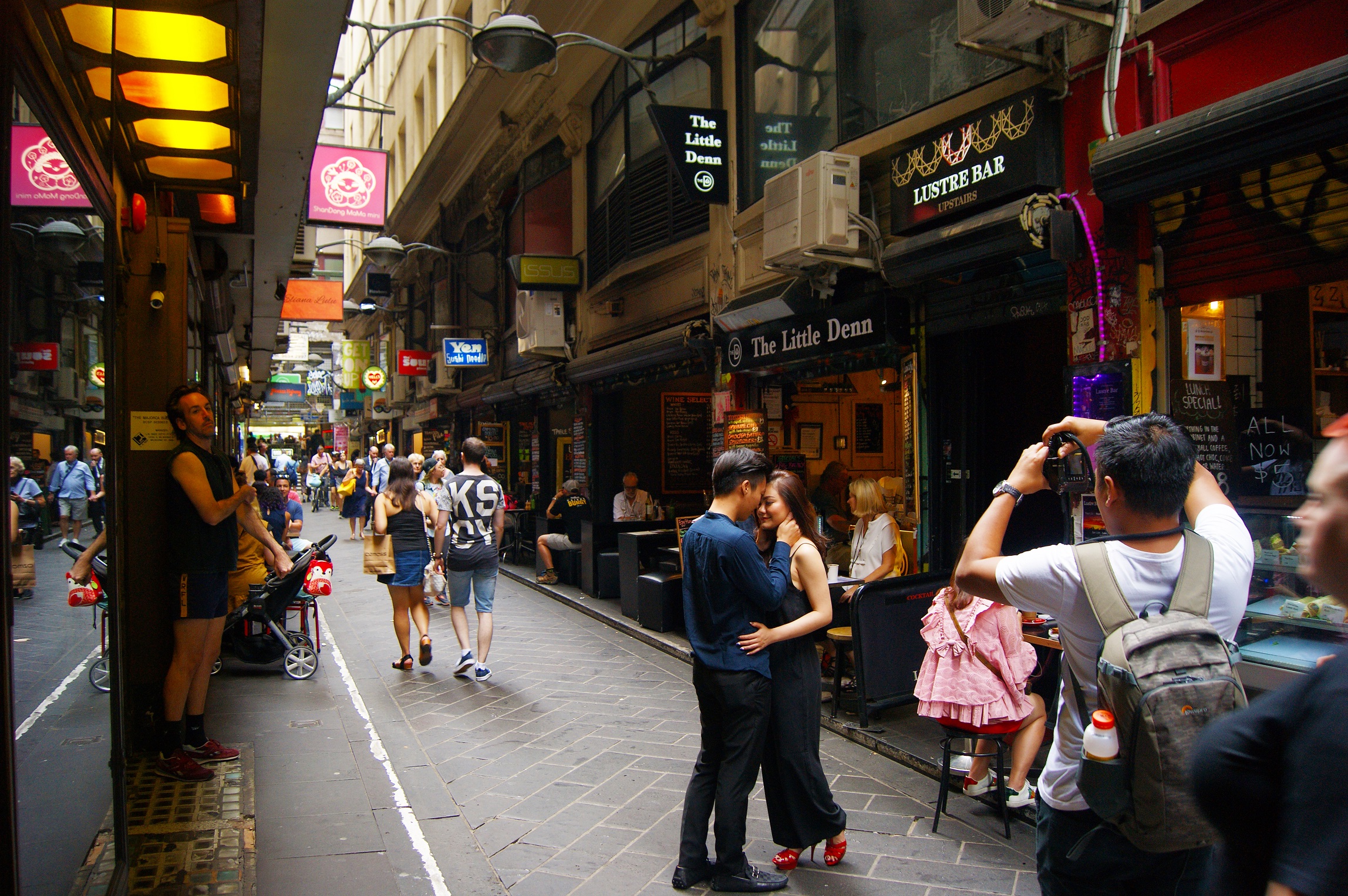 Melbourne laneway with cafes and urban street art