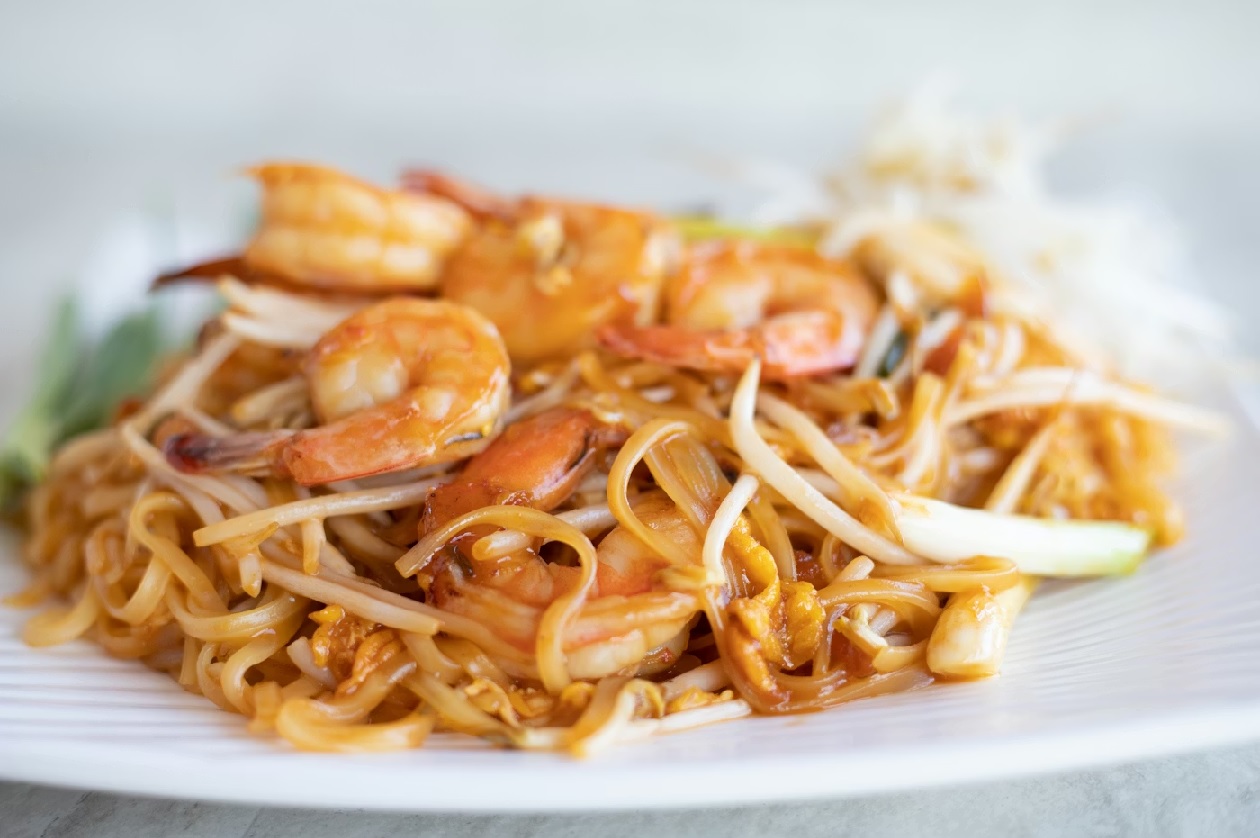 Thai street food dishes served at a market