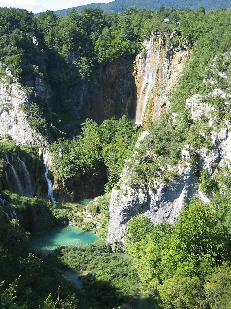 Croatia: Plitvice Lakes National Park with cascading turquoise waterfalls and wooden boardwalks