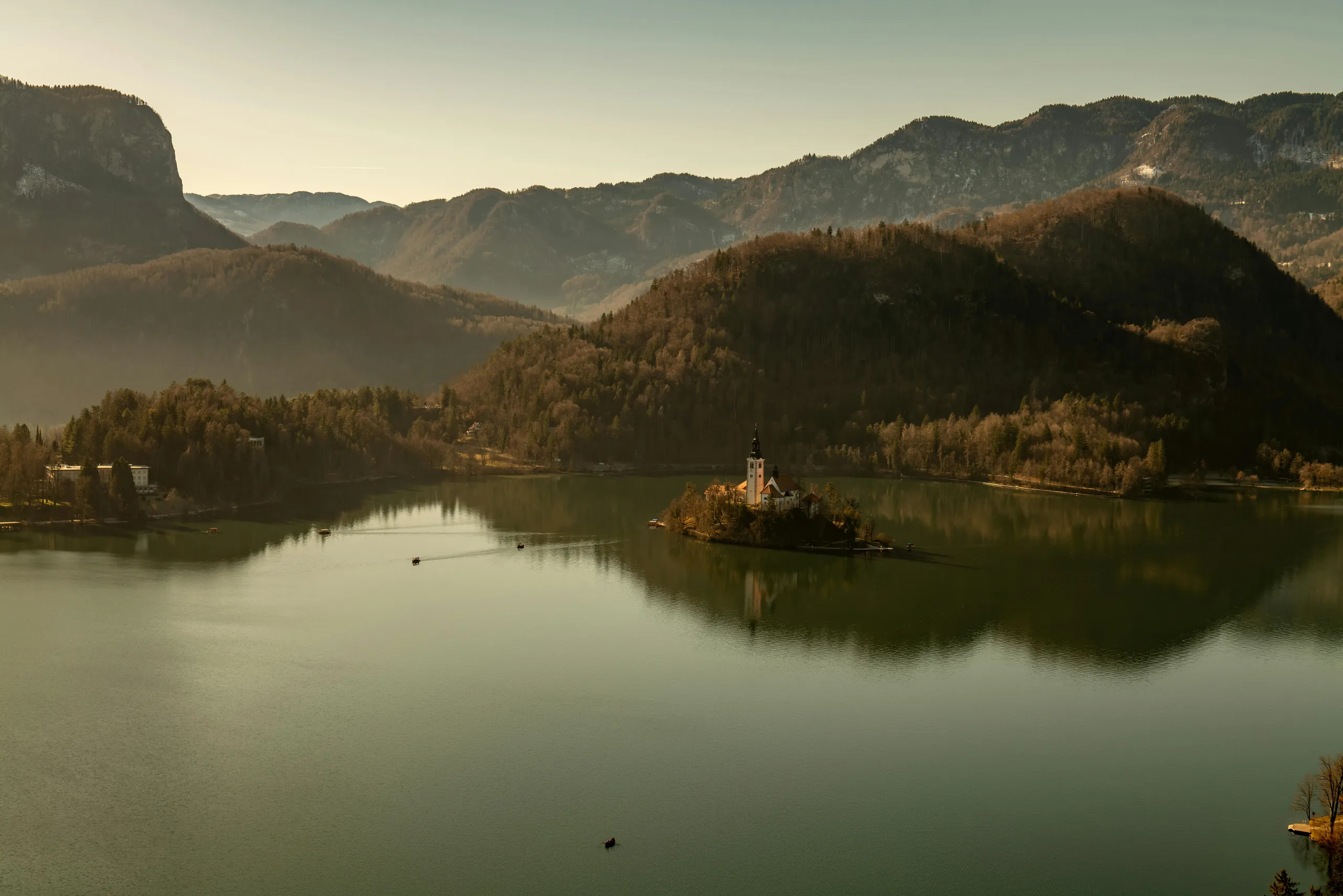Slovenia travel scene: Lake Bled with island church and Julian Alps mountains in background