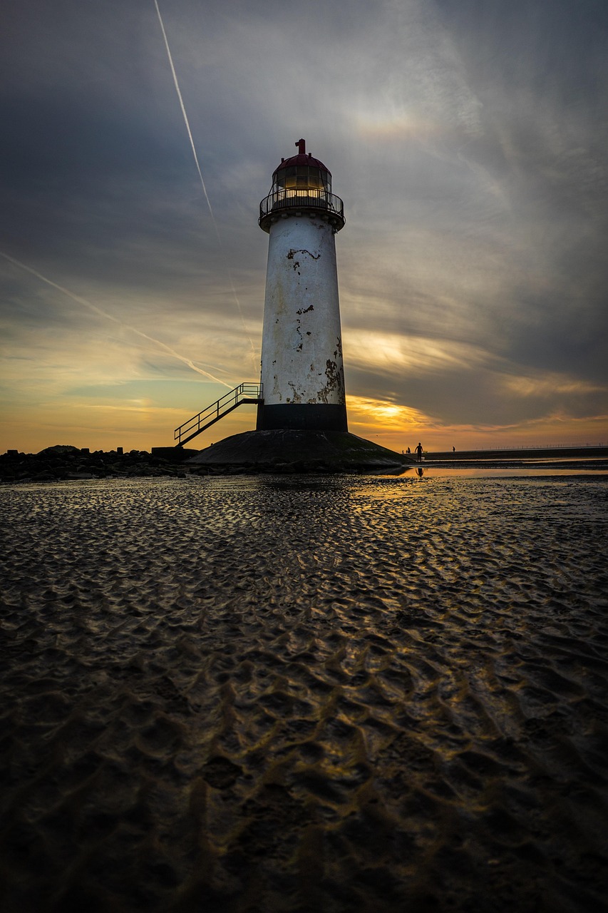 Wales travel scene: moody coast, castle stone, and mountain air