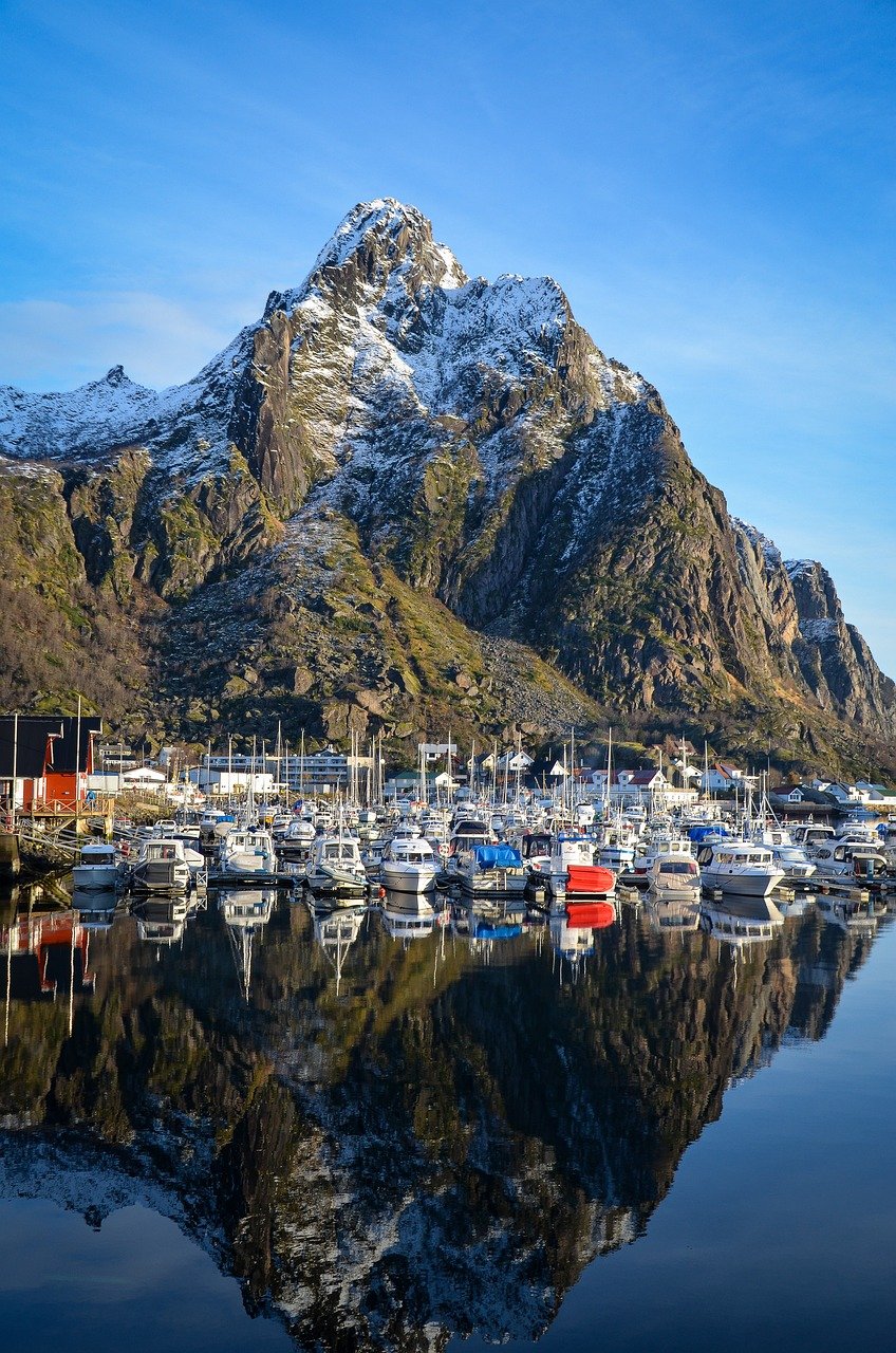 Norway Lofoten Islands with red rorbuer cabins and mountains