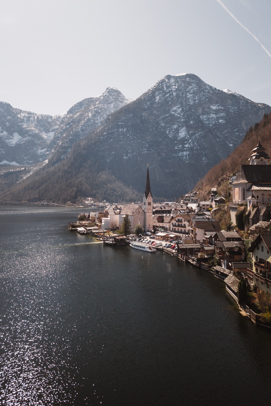 Austria travel scene: alpine lake calm, mountain air, and easy rhythm