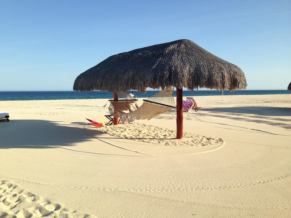 Beach palapa and hammocks beside the sea in Baja California