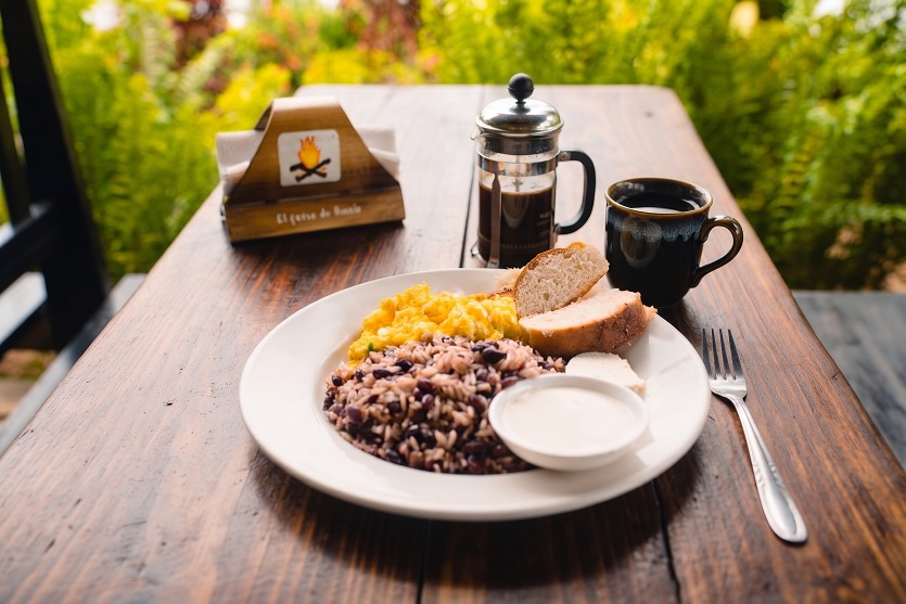 Gallo pinto rice and beans with eggs, bread and coffee