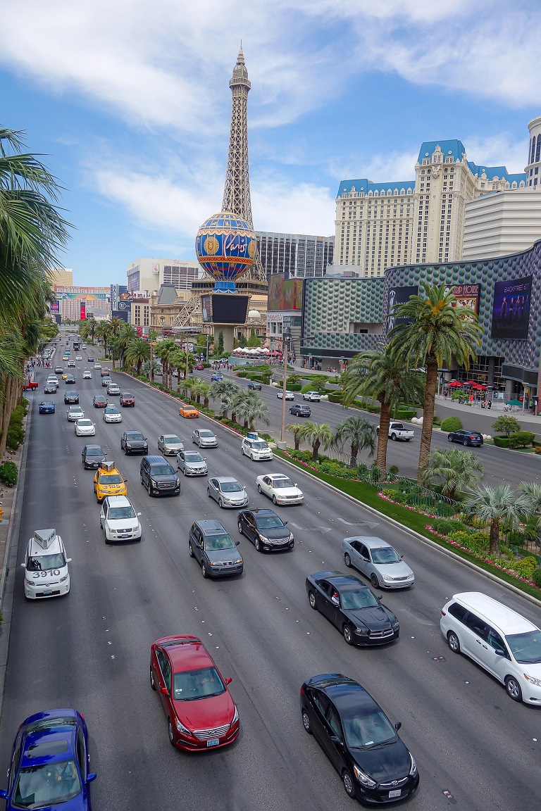 Traffic on the Las Vegas Strip beside the Paris Las Vegas Eiffel Tower replica