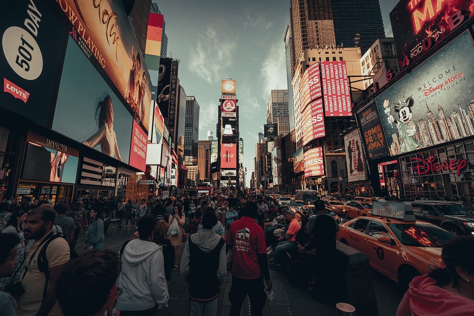 Crowds and yellow taxis in Times Square, New York