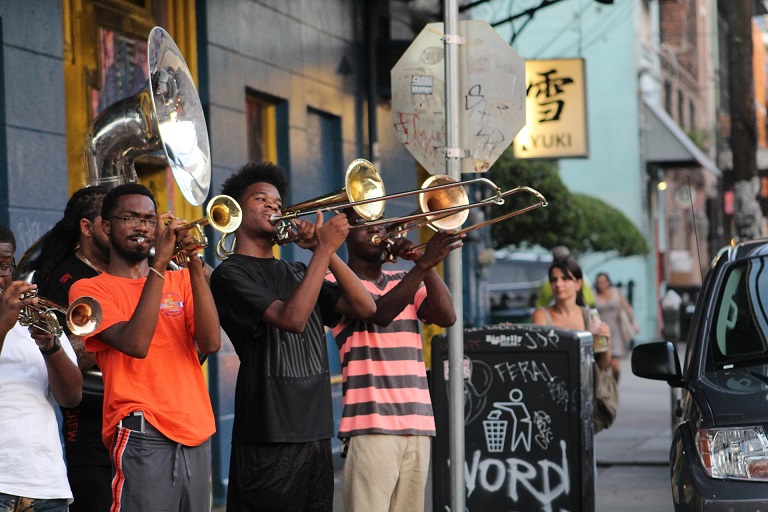 Brass musicians performing on a New Orleans street