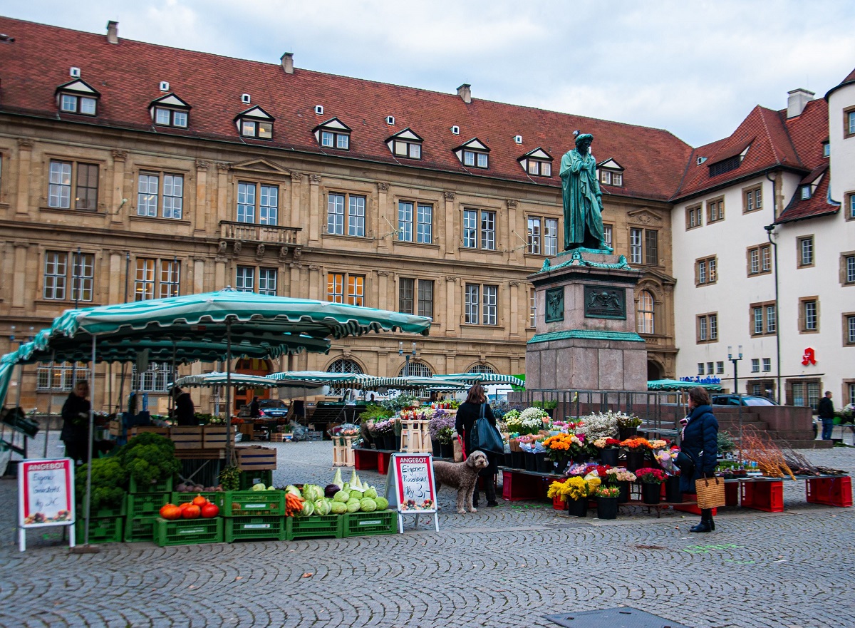 Local market in Stuttgart showing the everyday neighbourhood life slow travellers have time to notice