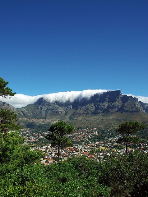 Cloud spilling over Table Mountain above Cape Town